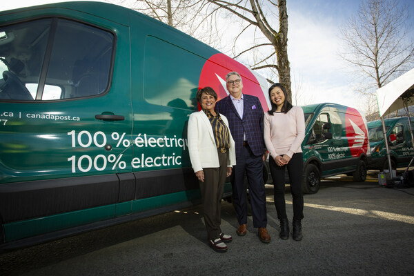 Photo (left to right): Canada Post's Suromitra Sanatani, Chair of the Board of Directors, Doug Ettinger, President and CEO, and Sally Dam, Director, Urban Delivery Strategy, stand by one of the new fully electric cargo vans at the Nanaimo, B.C., depot. Photo: Pinpoint National Photography (CNW Group/Canada Post)